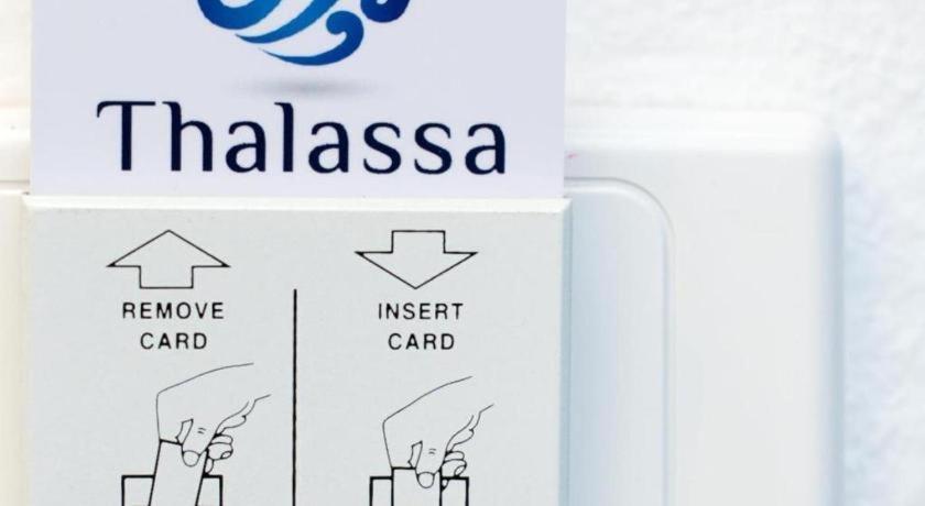 Thalassa Hotel Тау Экстерьер фото